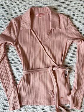 GUESS Ribbed Wrap babydoll coquette Long-Sleeve Top in Blush Pink